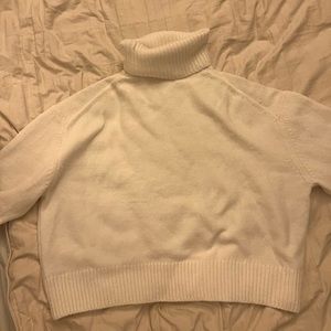 white turtle neck sweater
